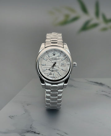 Rol.ex oyster date with white dial